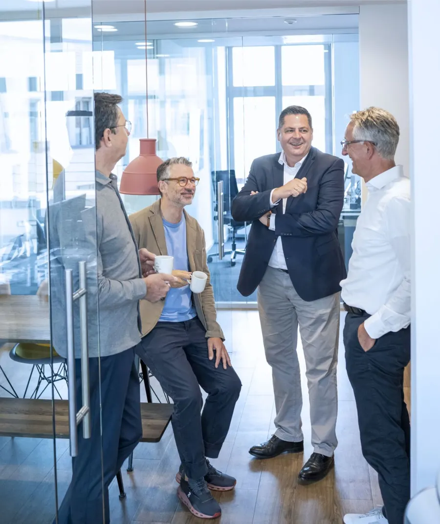 Die vier Gründer von ak.&Co.: Sven Albrecht, Andreas Kitta, Holger Knaup und Carsten Riehemann im Hamburger Büro